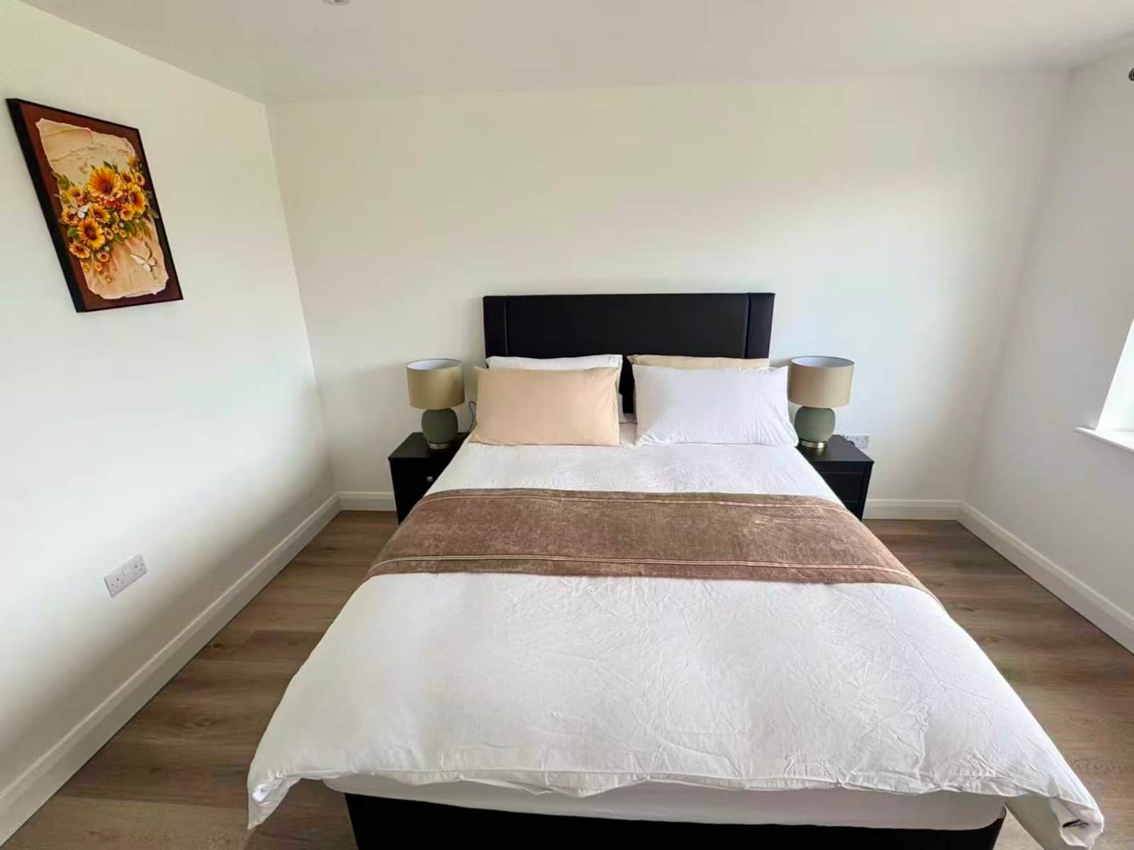 Bedroom one with a double bed