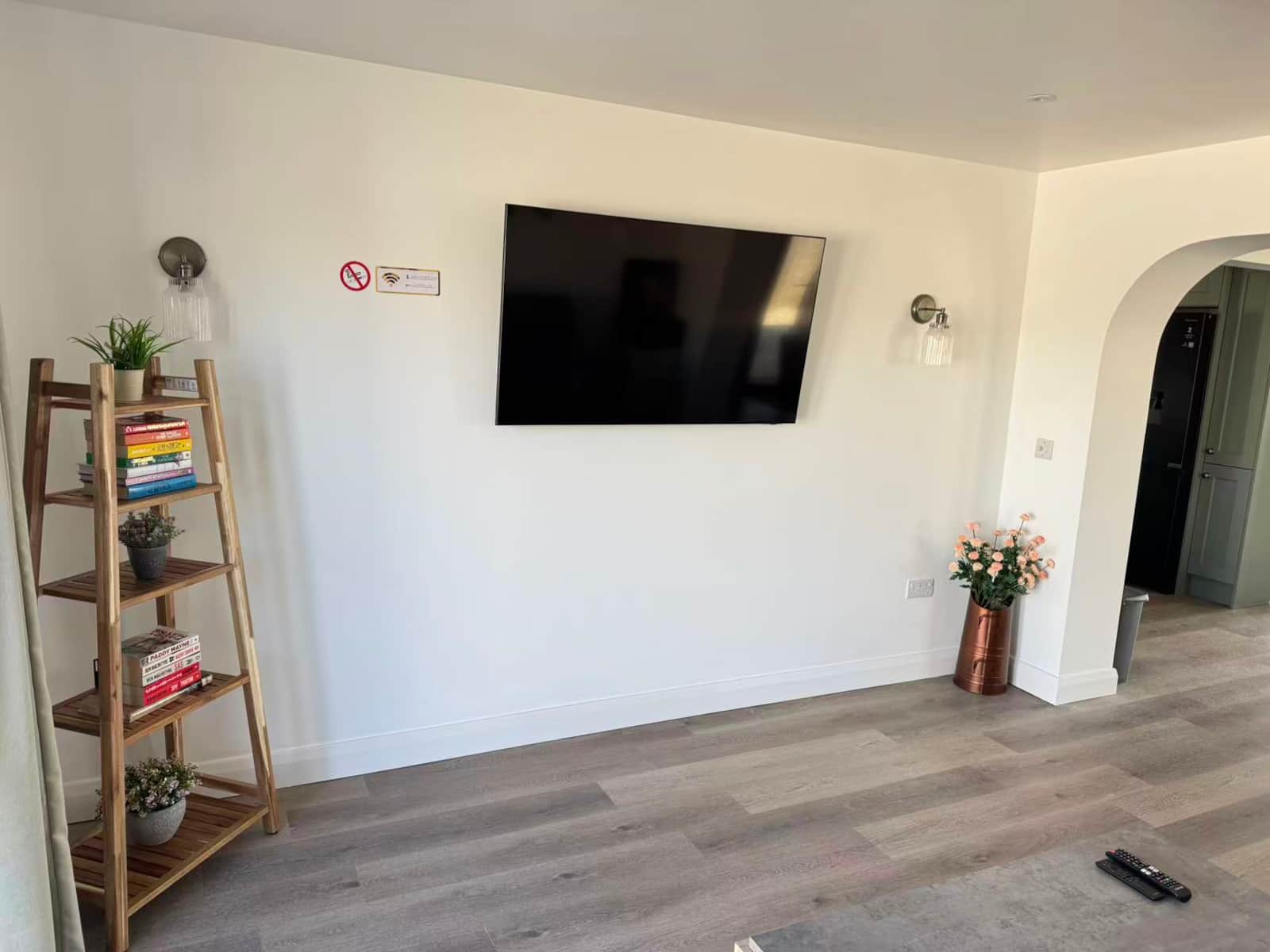 Sitting room television and reading shelf